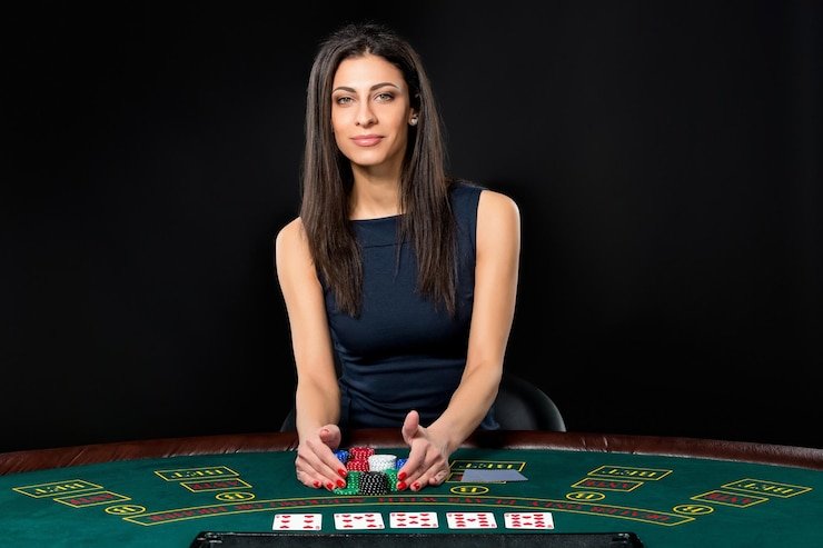 Live dealer table interface showing player position, chat, and real-time gameplay